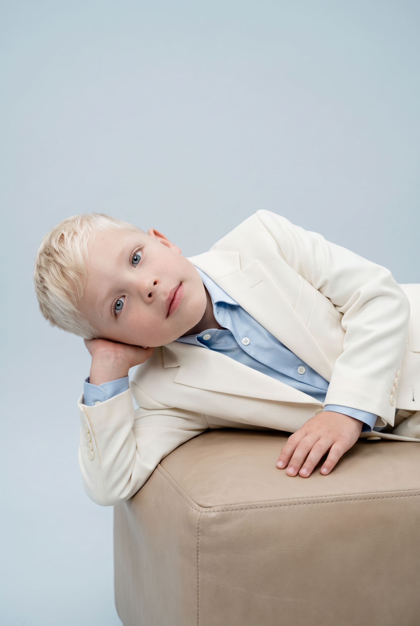 Ivory tailored suit editorial portrait
